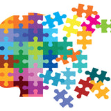 A picture of a head which is made up of many multi-colour jigsaw pieces. Some of the jigsaw pieces are breaking away from the head