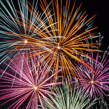 A number of fireworks exploding in many different colours