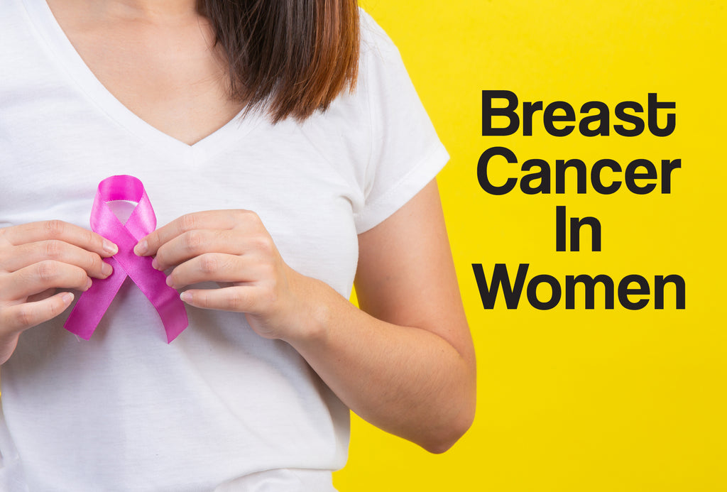 A woman in a white t-shirt. She is holding a pink