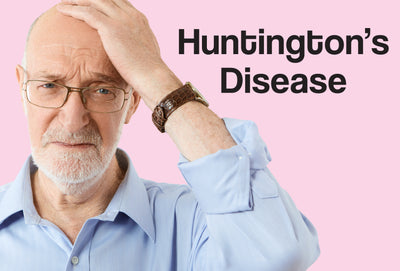 A middle aged man wearing a light blue shirt. He has his left hand on the top of his head – he looks confused. The words – Huntington's Disease – can be seen