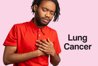 A man in a red polo shirt clutches his chest where his lungs are. The words – Lung Cancer – can be seen