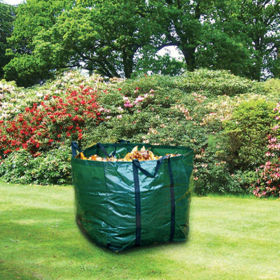 A Heavy Duty Garden Waste Bag filled with garden waste in a garden setting