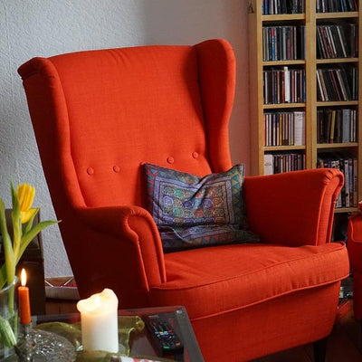 Red highback chair in living room
