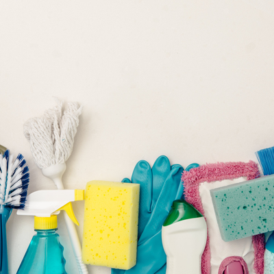 An array of multi-coloured cleaning brushes and sponges
