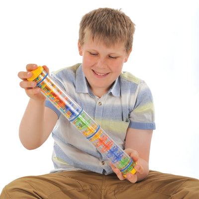 Child using Spectacular Rainstick