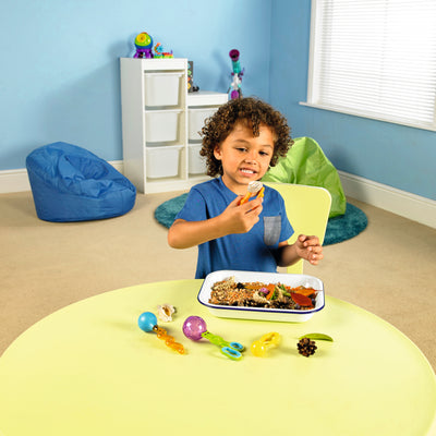 Child using the Fine Motor Tool Set