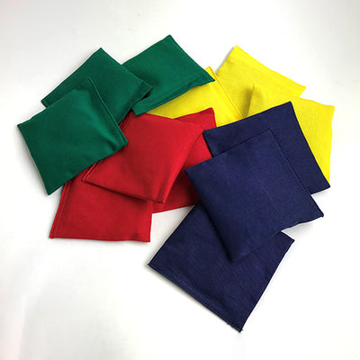 The image shows the set of 12 beanbags, 3 green, 3 red, 3 blue, and 3 yellow