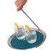 Single handed topple tray with two glasses