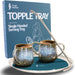 A Topple Tray with two dual handled mugs on it, next to the Topple Tray box