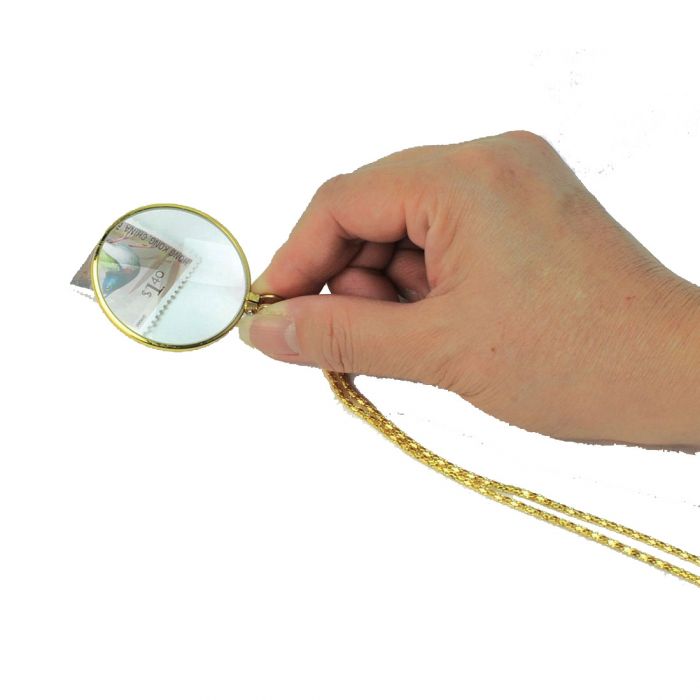 Lifemax Pendant Magnifier being used to magnify currency