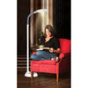 Lifemax High Vision Reading Light – Floor in use, lighting up woman reading book on chair