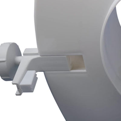 shows how the linton raised toilet seat clicks into place