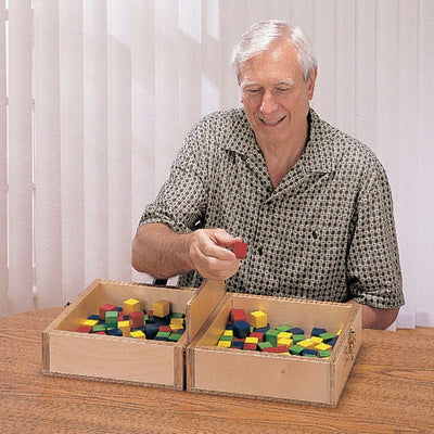 Man using the Box & Block Test