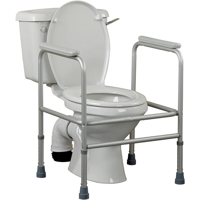 Homecraft Adjustable Aluminium Toilet Surround – Without Floor Fixing Feet, in use with a toilet