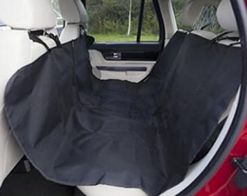 shows how the Crufts Car Hammock fits in the rear seats of a car