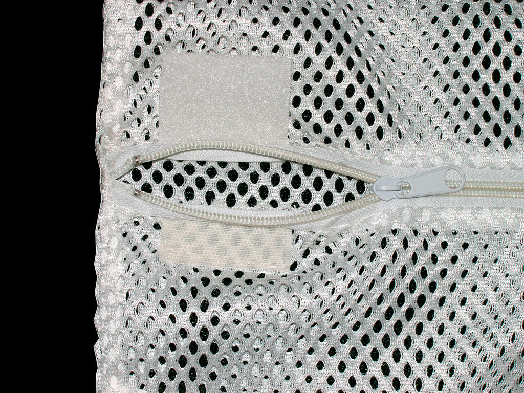 shows a close-up of the zip closure on a mesh laundry bag