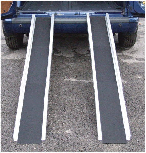 Two Channel Ramps being used to get to the back of a van from the ground