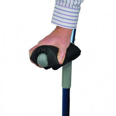 shows someone using a Harley Crutch Comfort Pad on a crutch handle