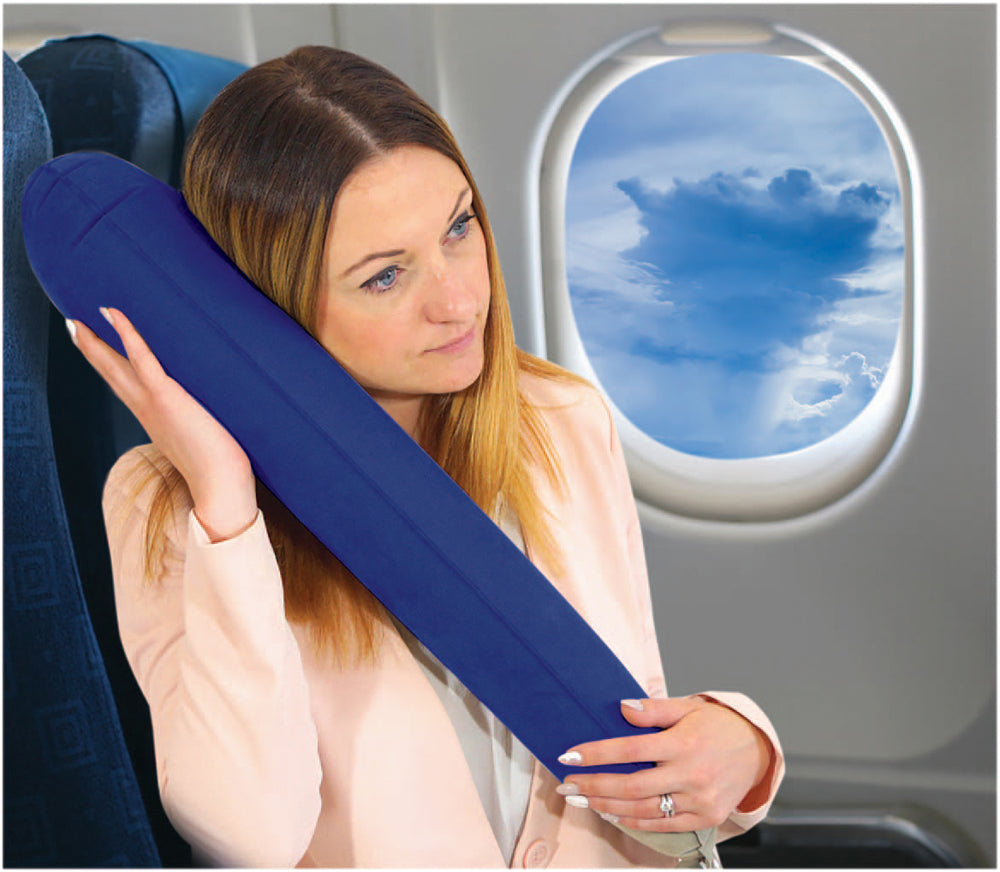 inflatable pillow being used on an aeroplane