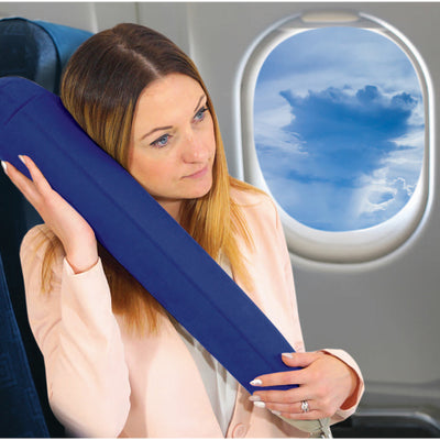 inflatable pillow being used on an aeroplane