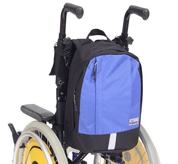 shows the Simplantex Mini Mobility Rucksack in Black/Bright Blue fitted to the back of a wheelchair