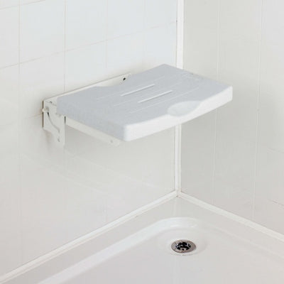 shows the wall mounted drop-down slatted shower seat fitted to a tiled wall over a shower tray