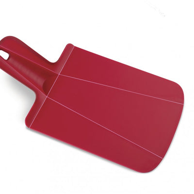 shows the josephjoseph chop 2 pot folding chopping board in small