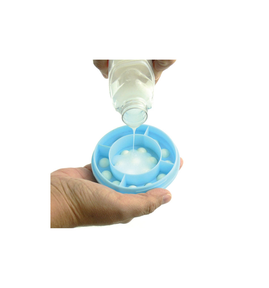 The image shows the applicator reservoir being filled with lotion