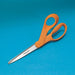 shows a pair of orange fiskars scissors