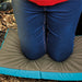 Home and Garden Memory Foam Folding Kneeler Cushion in use, person kneeling on it