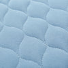The image shows a close-up of the Kylie Bed Pad
