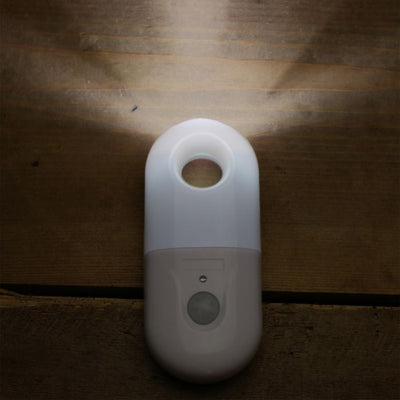 the image shows the lifemax always ready night light torch unplugged but glowing ready for use