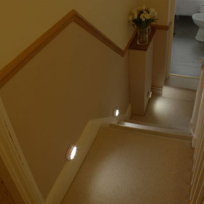 the image shows lifemax remote control wireless LED lights on a stairway