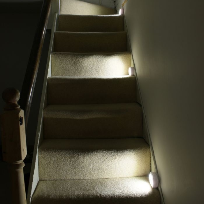 the image shows lifemax remote control lights on an indoor staircase