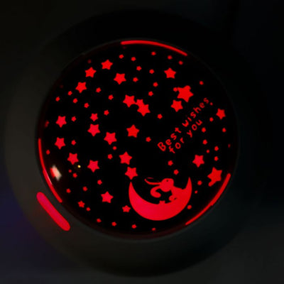 the image shows the top of the lifemax projection humidifier glowing with words and pictures