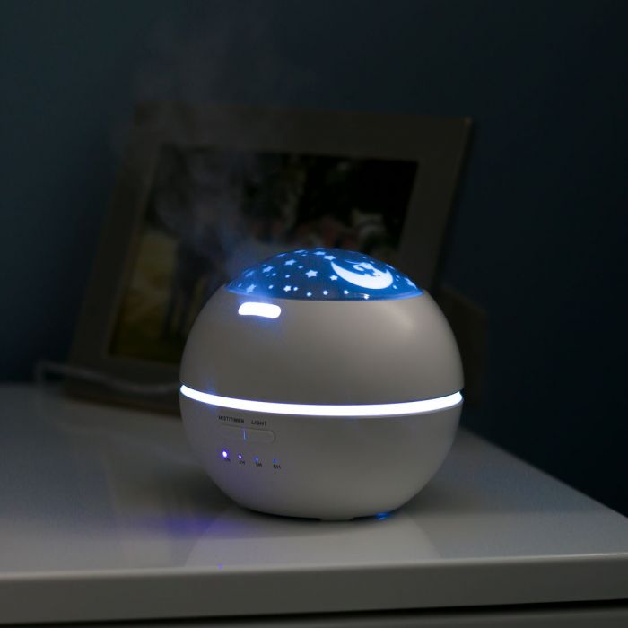 the image shows the lifemax projection humidifier in the dark