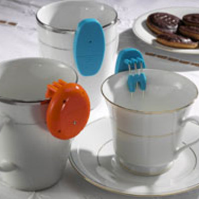 The Orange Vibrating Liquid Level Indicator on a mug