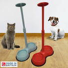 A cat and a dog sitting by a No Need to Bend Long Handled Pet Feeding Bowl