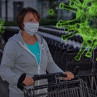 A woman pushing a supermarket trolley with a large, green bug by her side