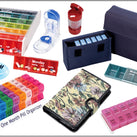 A composite picture with lots of different pill organisers – daily, weekly, monthly and travel options