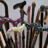 A collection of walking sticks that are available for sale on the Ability Superstore website