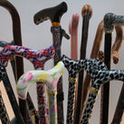 A collection of walking sticks that are available for sale on the Ability Superstore website
