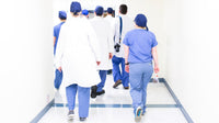 the image shows healthcare workers together