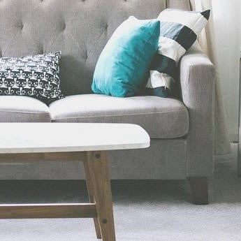 the image shows a chair with a raising foot on it