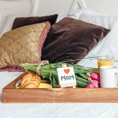 Lap tray with breakfast on bed