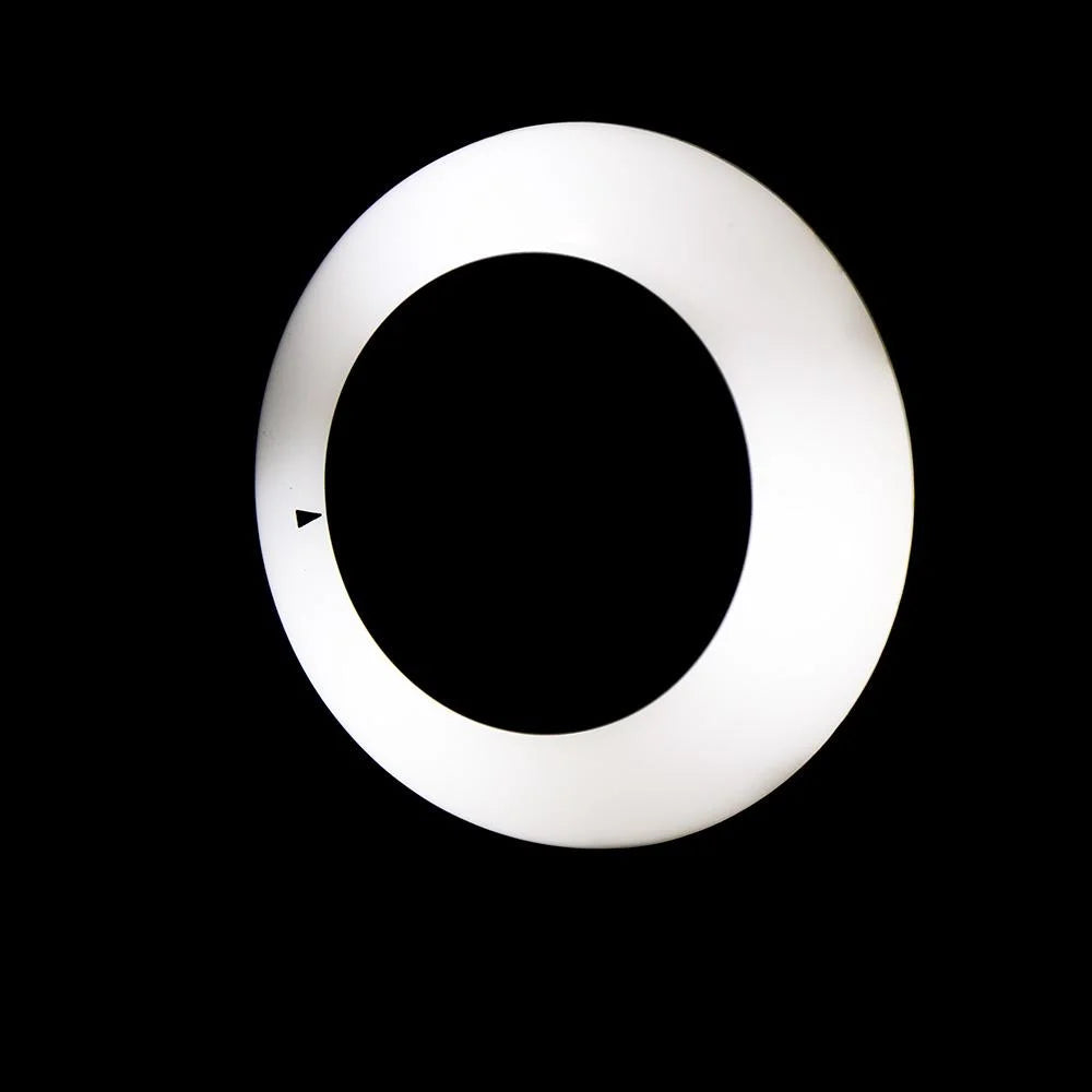 Lifemax Plug Through Night Light fully lit in a dark room