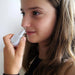 Lifemax Rechargeable Hay Fever and Allergy Reliever in use by a young woman