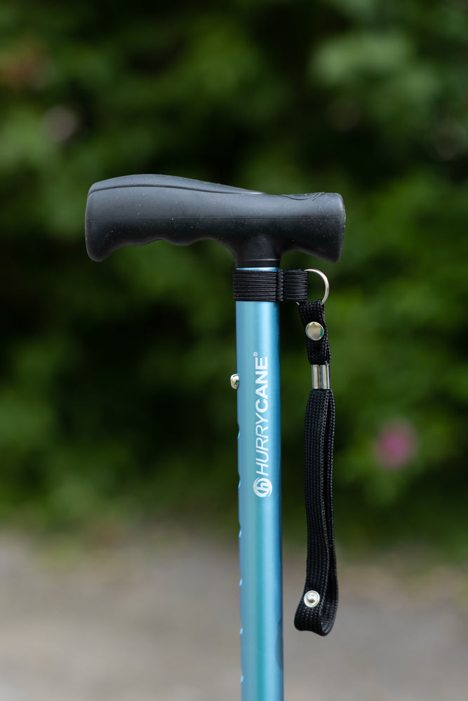 A close up of the blue Hurrycane Freestanding Walking Stick