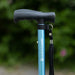 A close up of the blue Hurrycane Freestanding Walking Stick