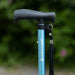 A close up of the blue Hurrycane Freestanding Walking Stick